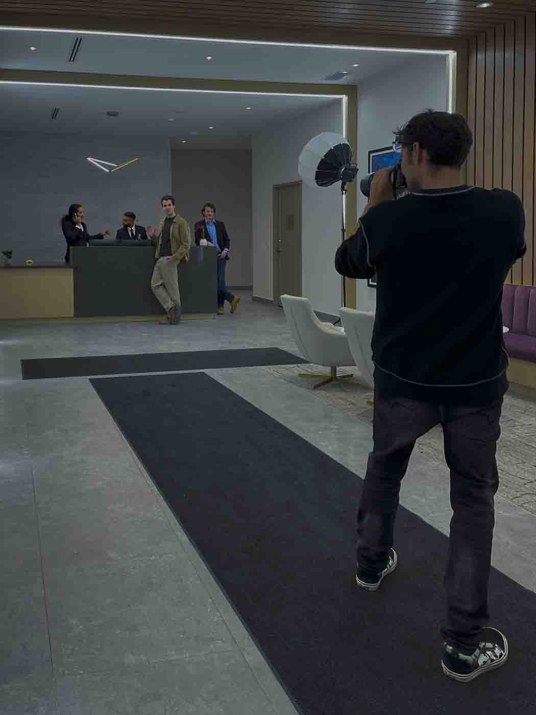 Camera and studio lighting setup for photography services